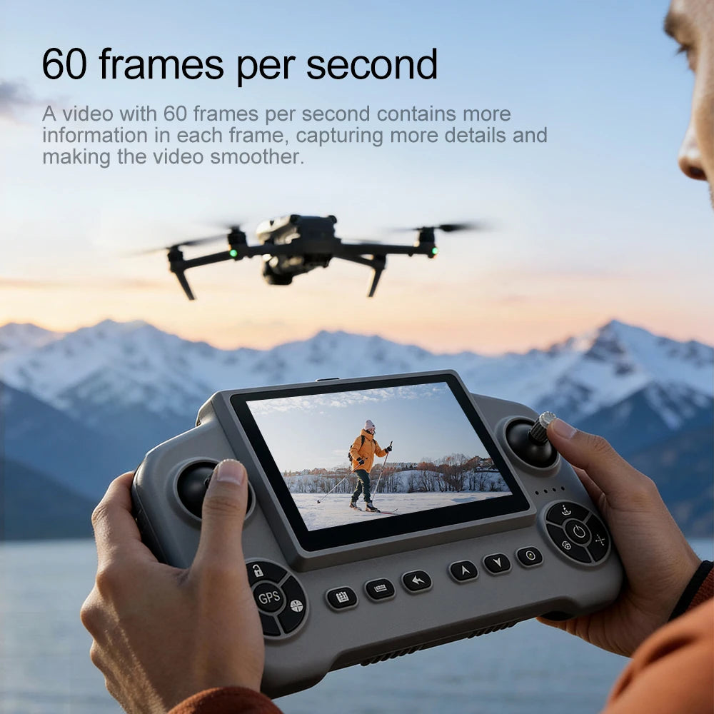 Person controlling a drone with a controller and screen displaying a snowy landscape.