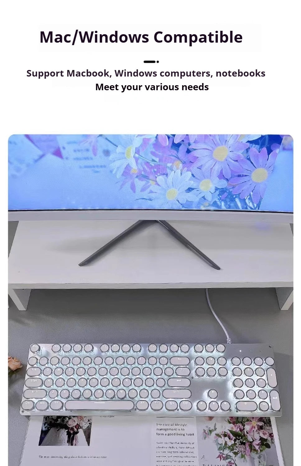 Floral-themed computer screen with keyboard on a desk