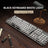 Punk mechanical keyboard on a wooden surface with a lamp and pen