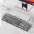 Mechanical keyboard on a desk with measurements displayed